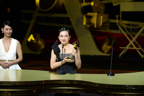 Yeo Yann Yann chokes up as she receives the Best Supporting Actress award for her performance in Ilo Ilo